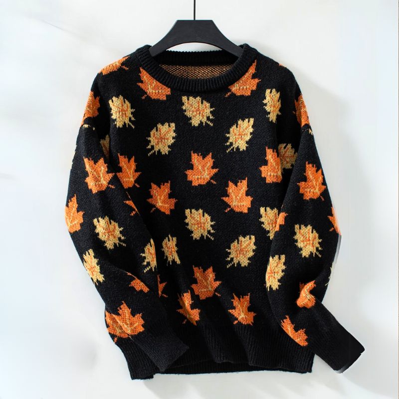 Black leaf print crew neck sweater on hanger