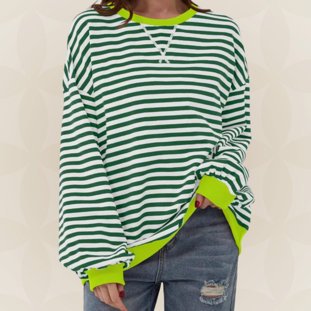 Odette oversized striped crew neck sweater in green with neon contrast trim, front view