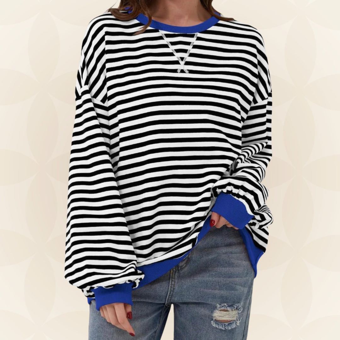 Odette oversized striped crew neck sweater in black and white with blue contrast trim, front view