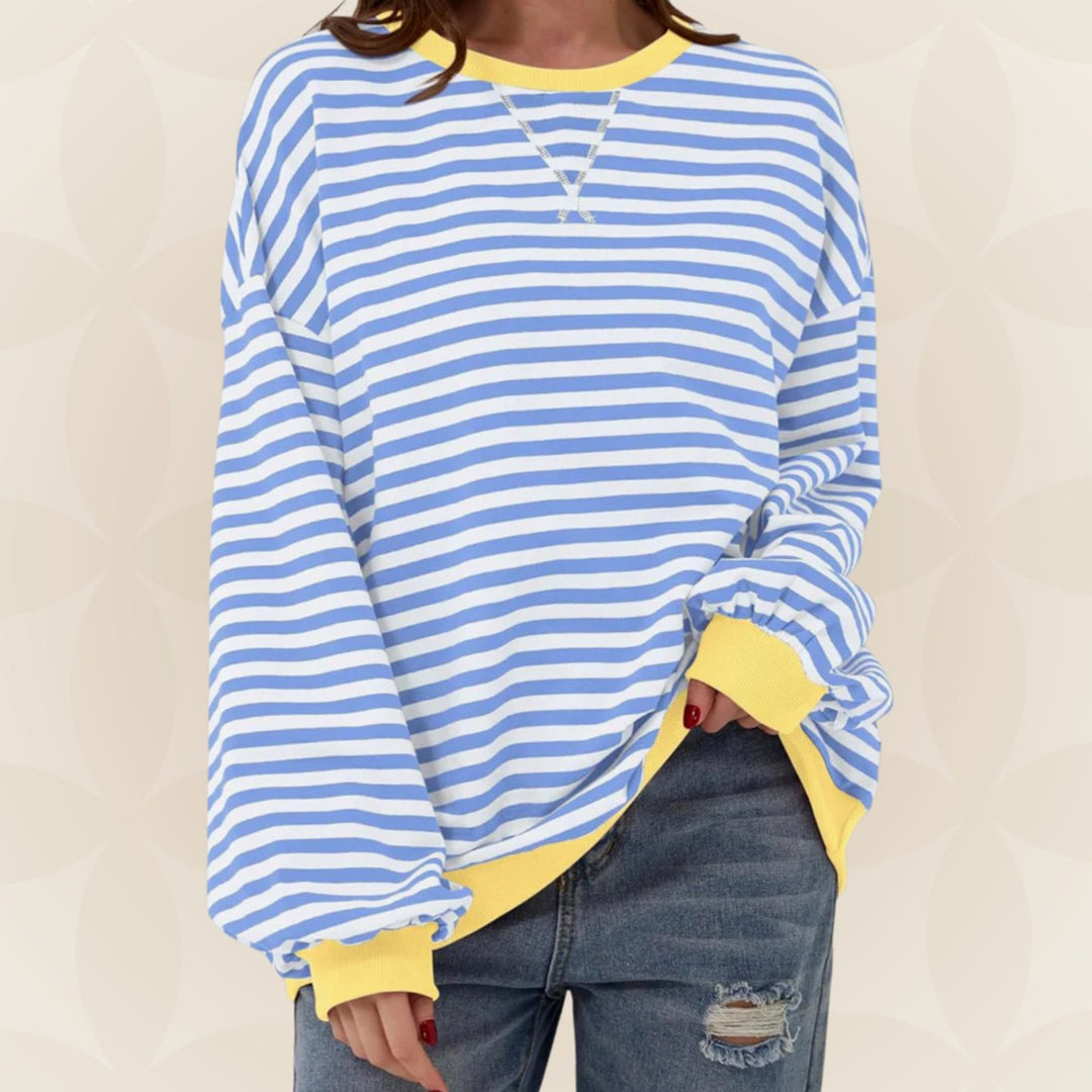 Odette oversized striped crew neck sweater in light blue with yellow contrast trim, front view