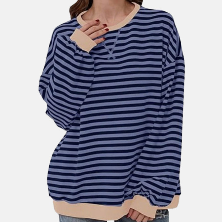 Rosalie oversized striped sweater with round neck, close-up front view in navy stripe