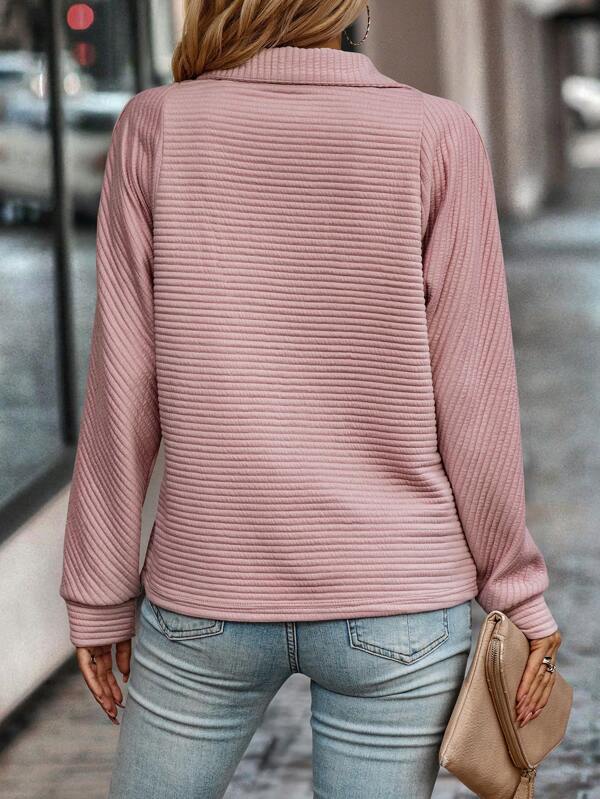 Harlow black ribbed quarter zip mock neck sweater, close-up front view