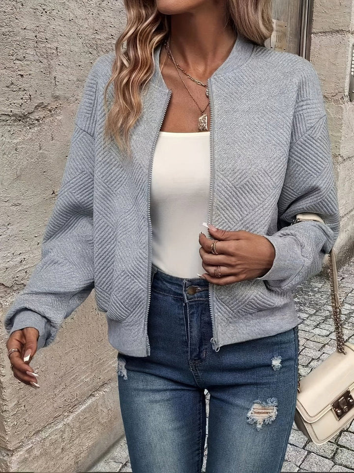 Delphine quilted zip-up bomber jacket in gray, front view close-up