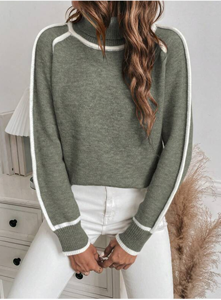 Wren turtleneck pullover sweater in sage green, styled with white jeans