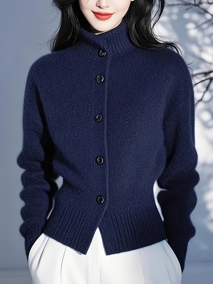Wren navy high-neck button cardigan, hem and button close-up