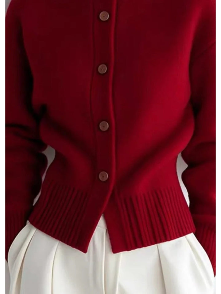 Wren high-neck button cardigan, close-up hem and buttons